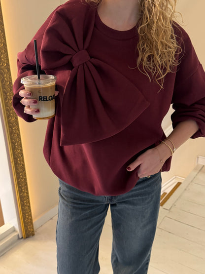  Bordeauxrode strik trui