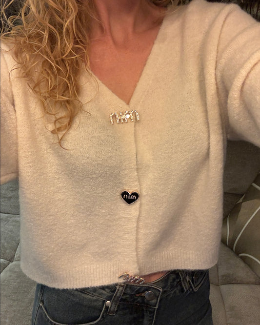 Zachte wollen vest met broches