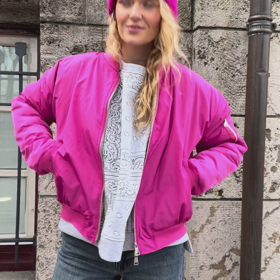 Roze bomerjas met teddystof